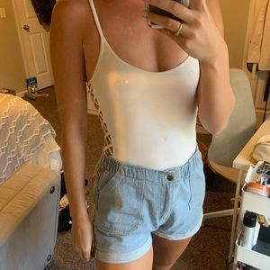 White body suit with cut outs